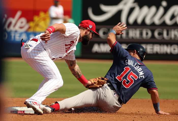 Feb 28, 2024; Clearwater, Florida, USA; Philadelphia Phillies third baseman Weston Wilson (37) tags out Atlanta Braves second baseman Luis Guillorme (15) during the third inning at BayCare Ballpark. Mandatory Credit: Kim Klement Neitzel-USA TODAY Sports